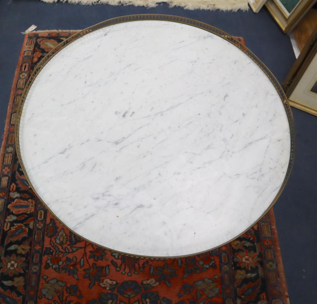 A pair of French style mahogany occasional tables with brass galleried marble tops, 65cm diameter, 75cm high